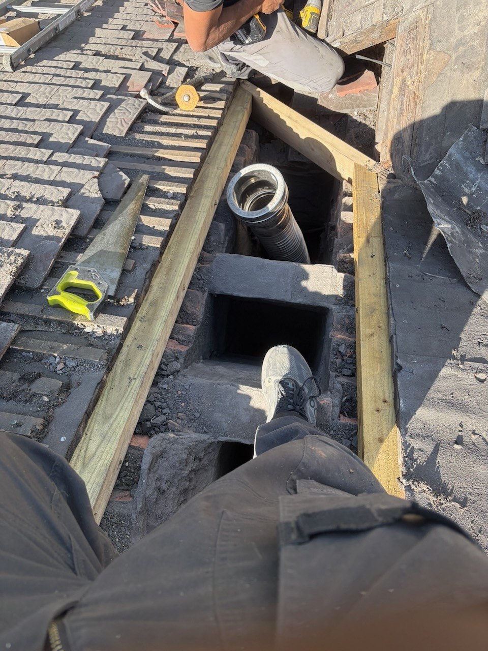 Roof opened during chimney removal and framing alterations in Ormskirk