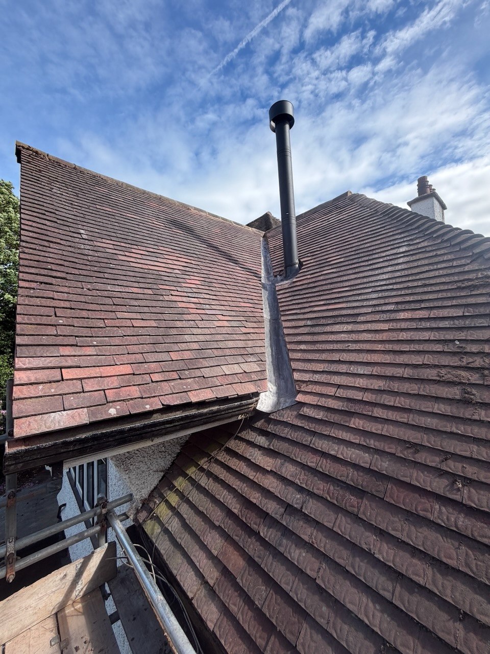 Completed roof after large chimney removal and valley reconstruction on Ruff Lane