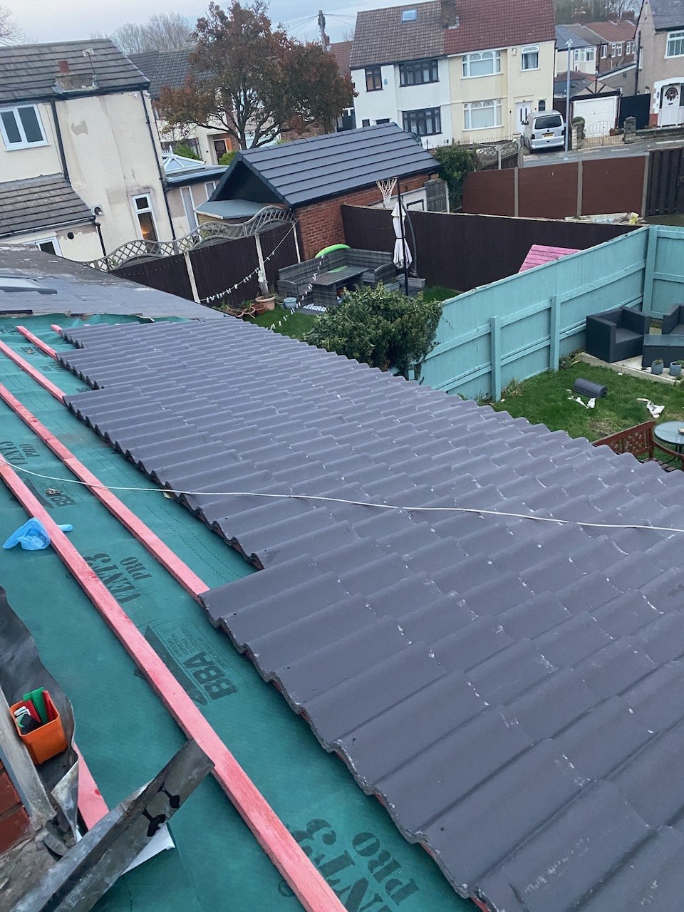 The extension roof during replacement in Crosby