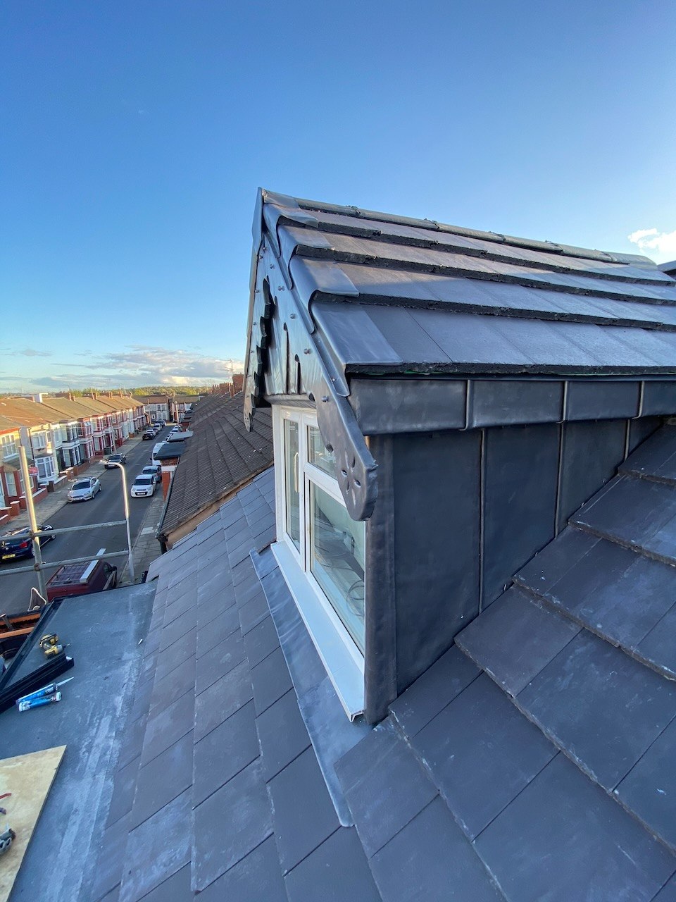 Side view of the bespoke Code 5 leadwork and retained decorative bargeboard shape on the Wallasey dormer